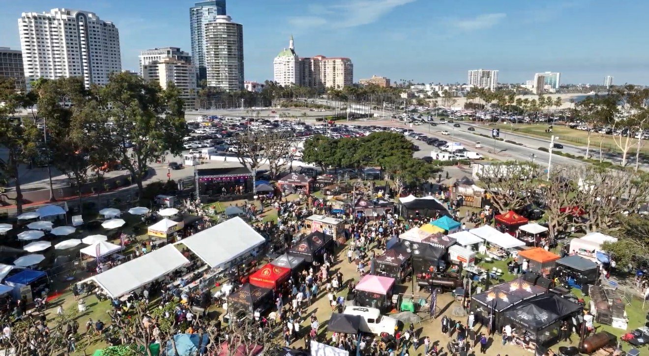 Aerial view of festival grounds with beach in background